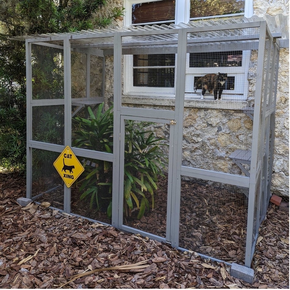 a finished catio attached to a house