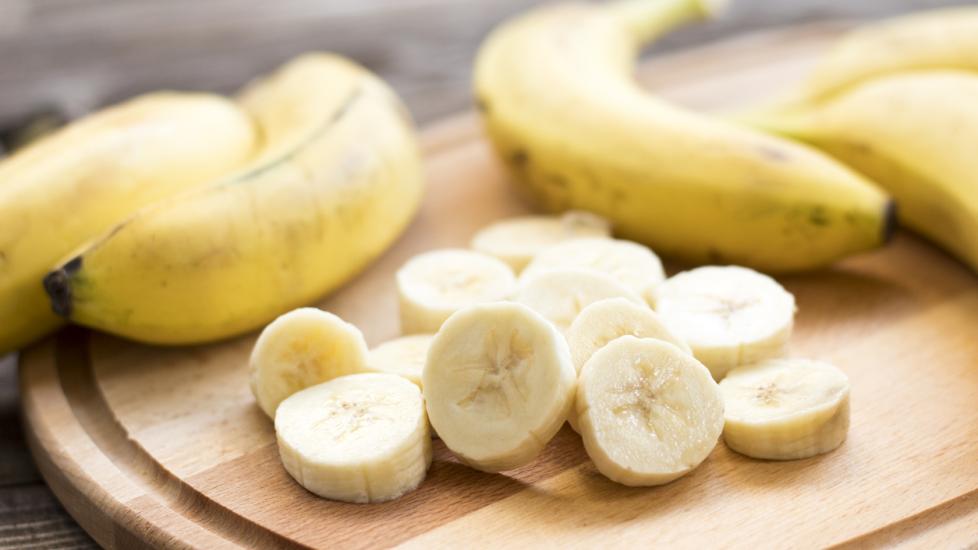 cutting board of bananas